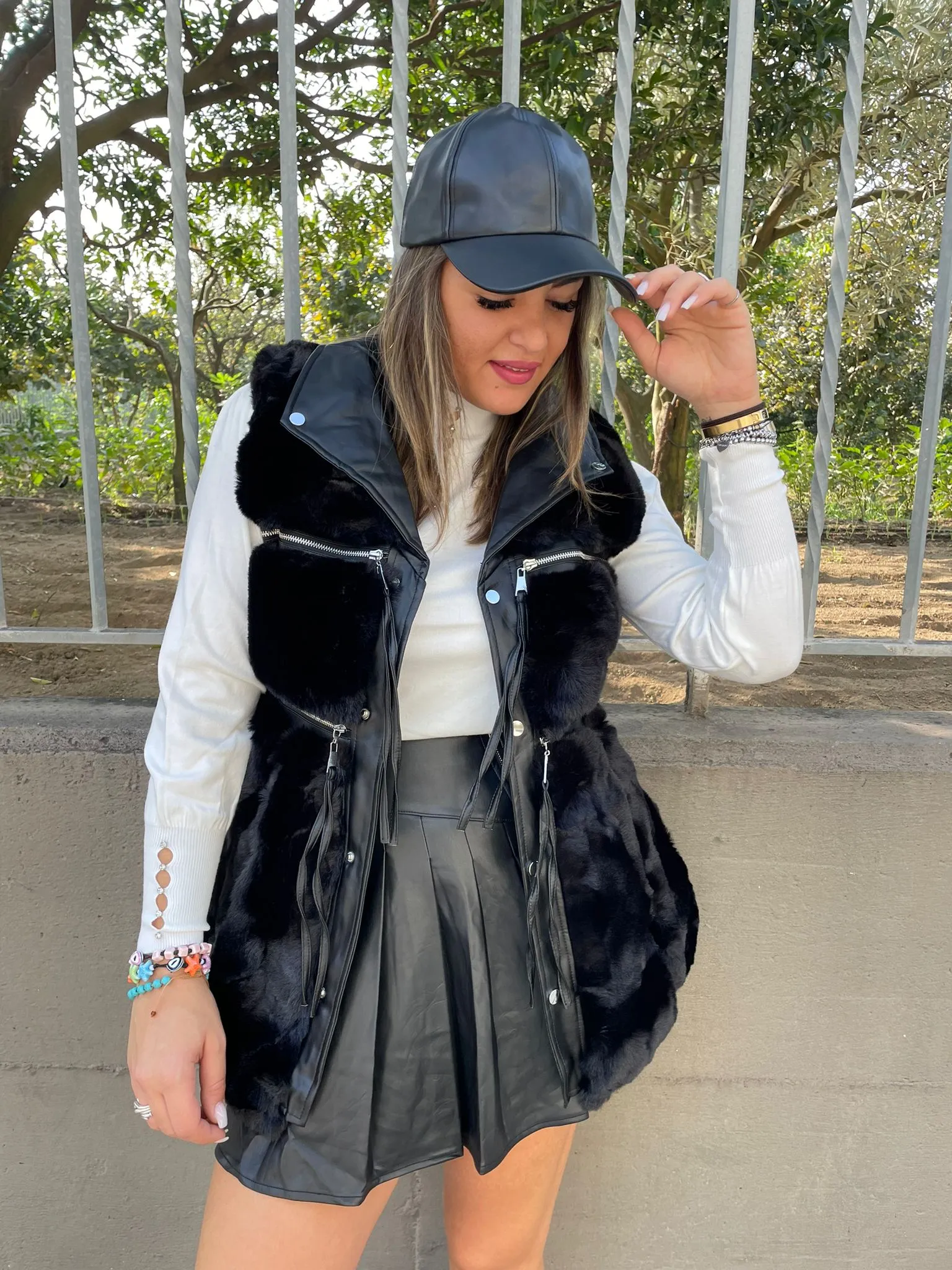 Black sleeveless eco fur jacket