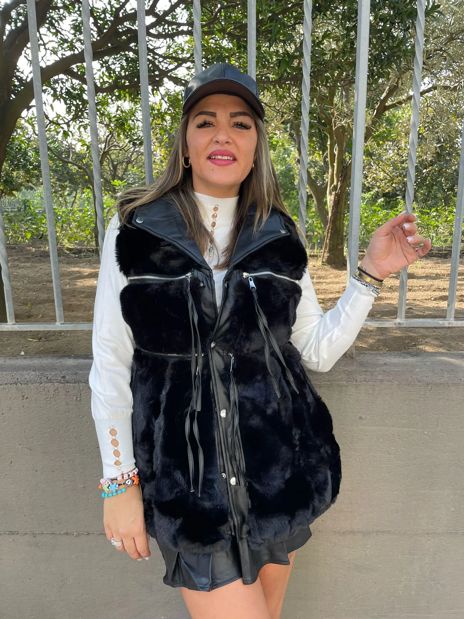 Black sleeveless eco fur jacket