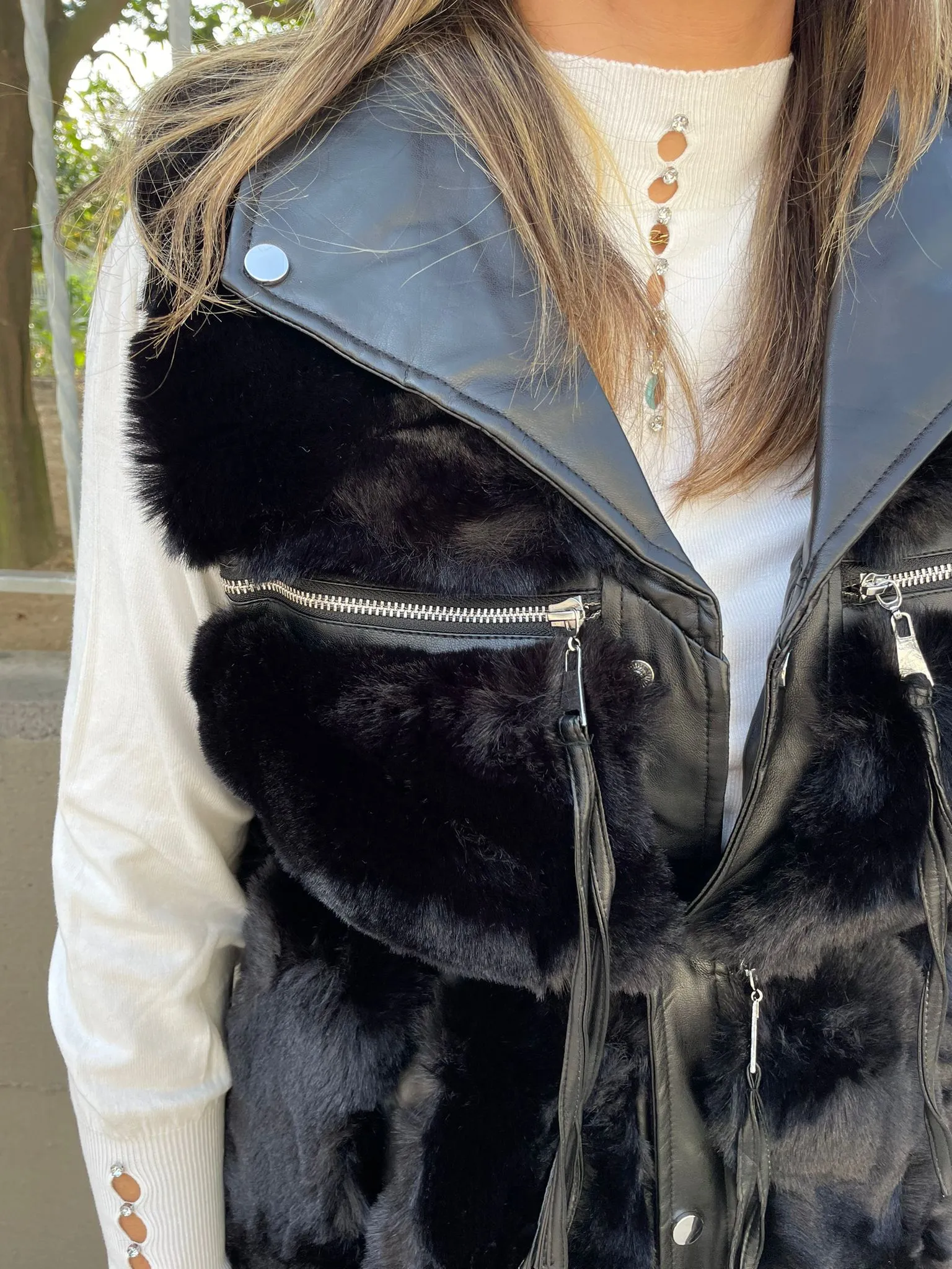 Black sleeveless eco fur jacket