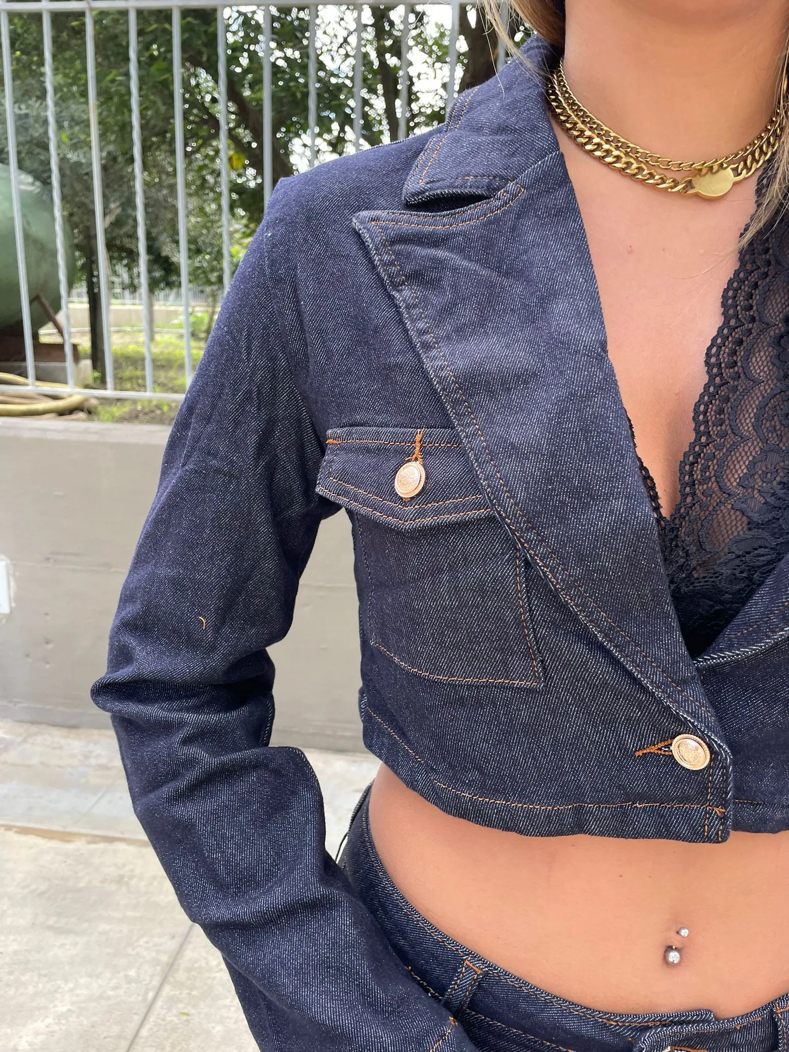 Dark-wash denim blazer.