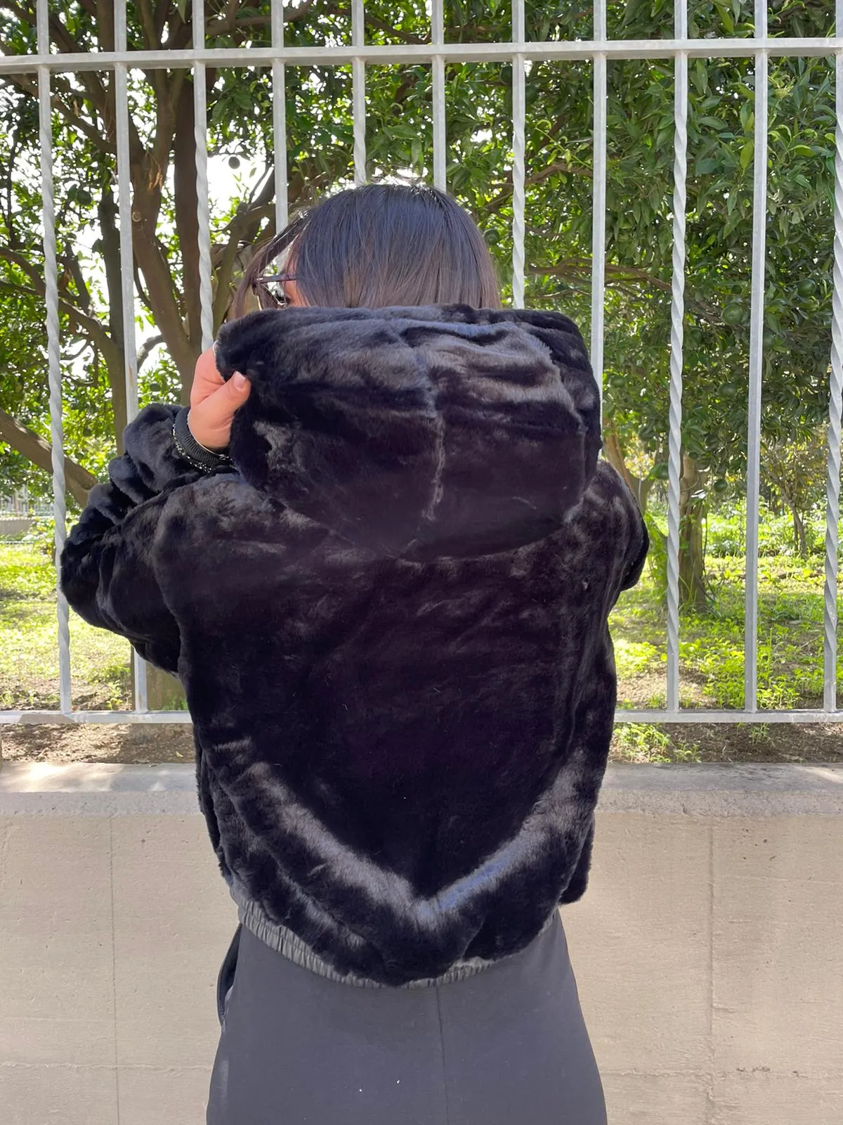 Eco fur hoodie with zipper.