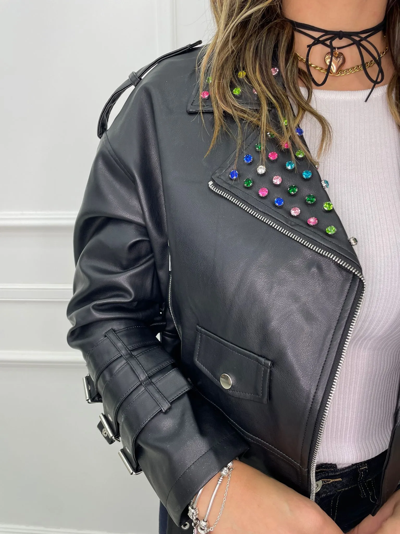 Eco-leather jacket with colorful studs.