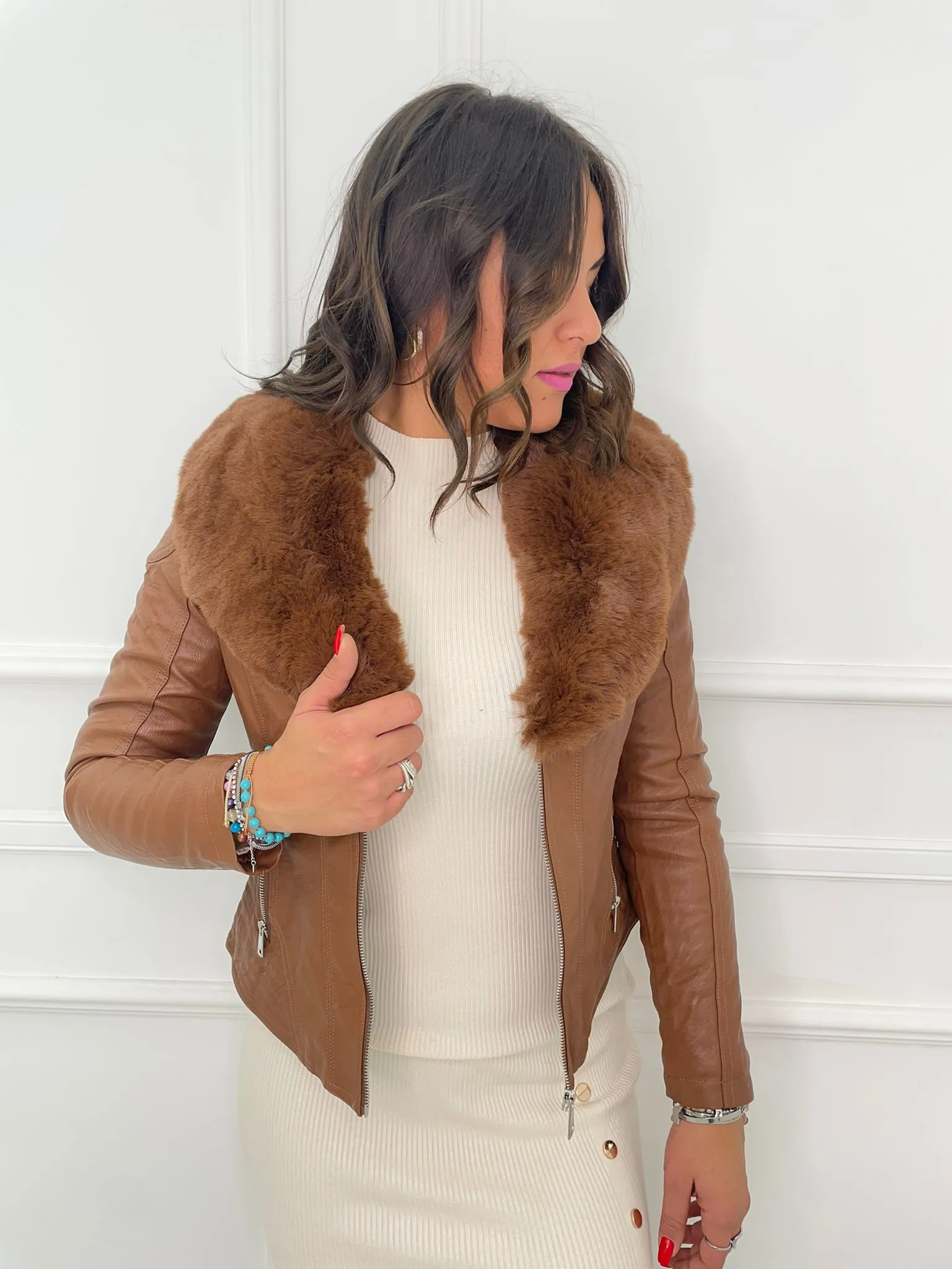 Faux leather jacket with faux fur collar.