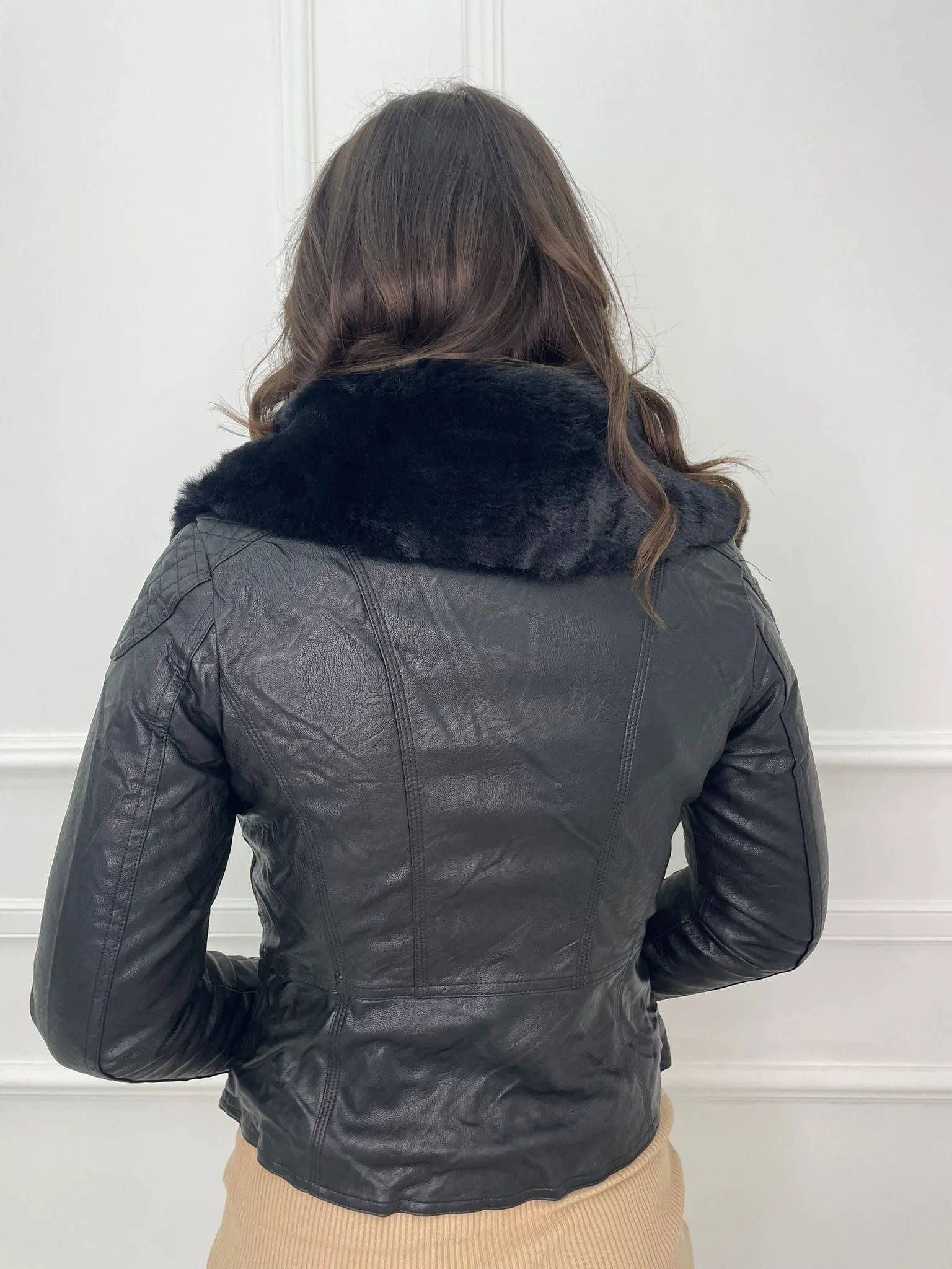 Faux leather jacket with faux fur collar.