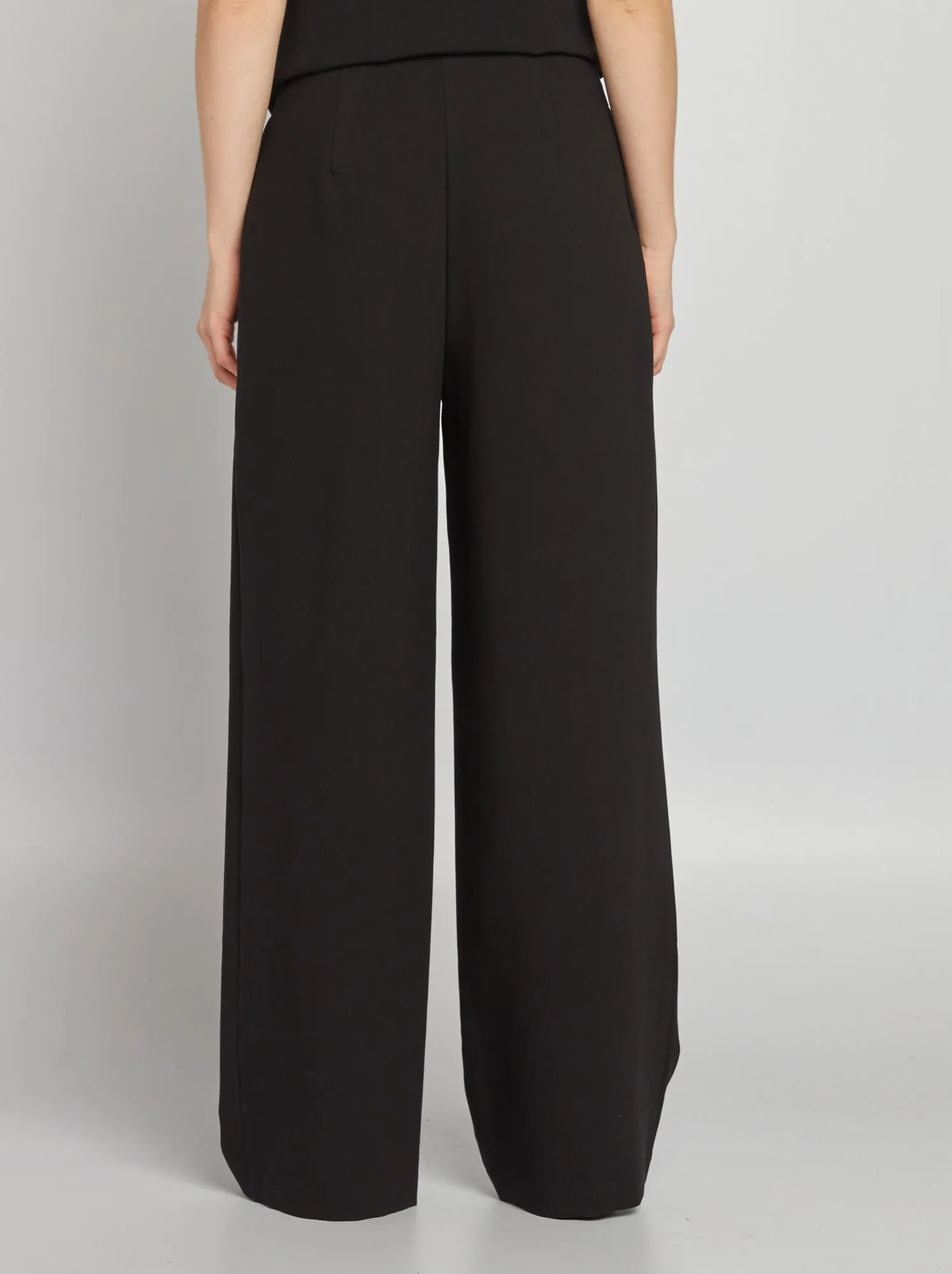 High-waisted wide-leg pants - black.