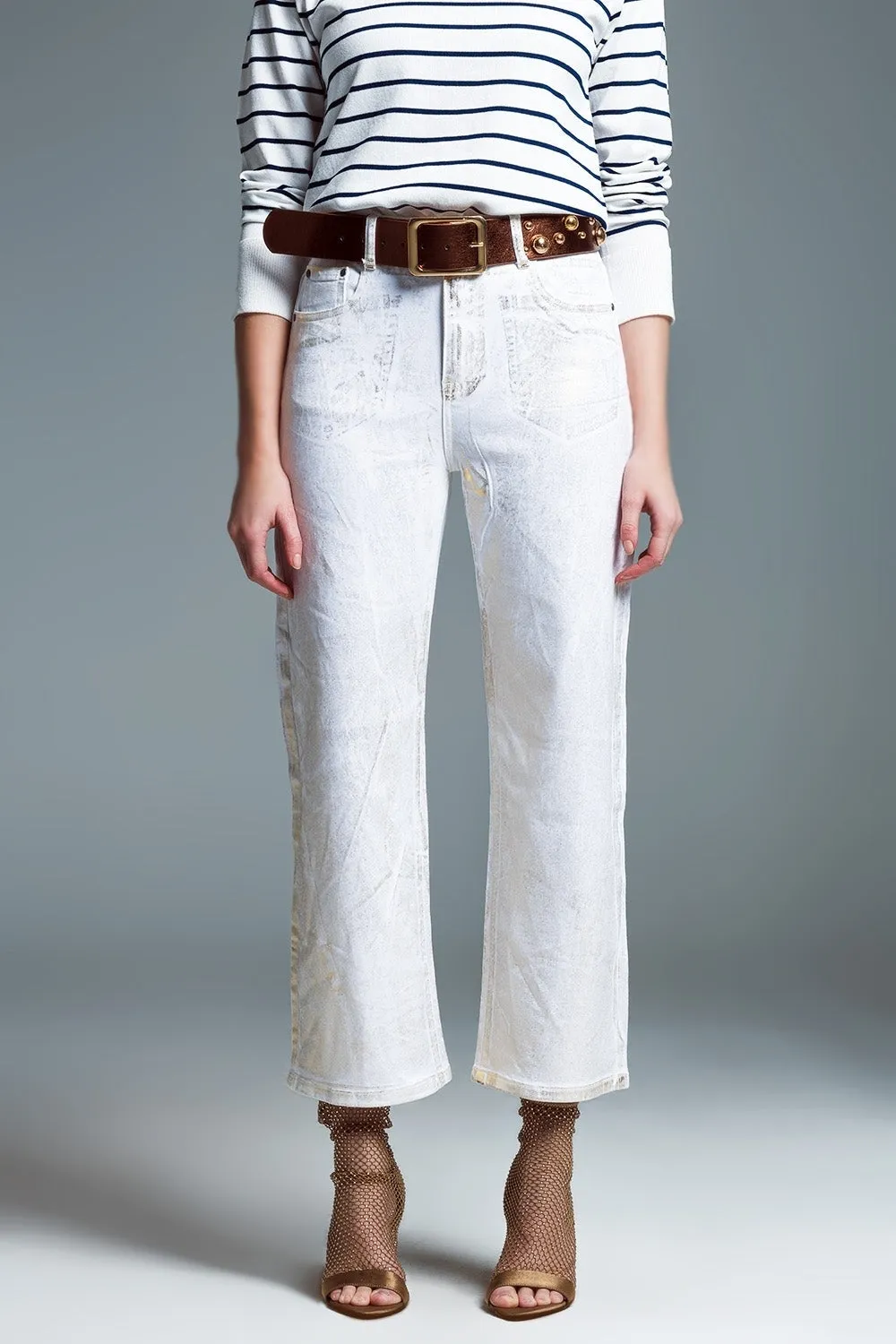 Jeans bianchi a gamba larga con finitura metallizzata in oro