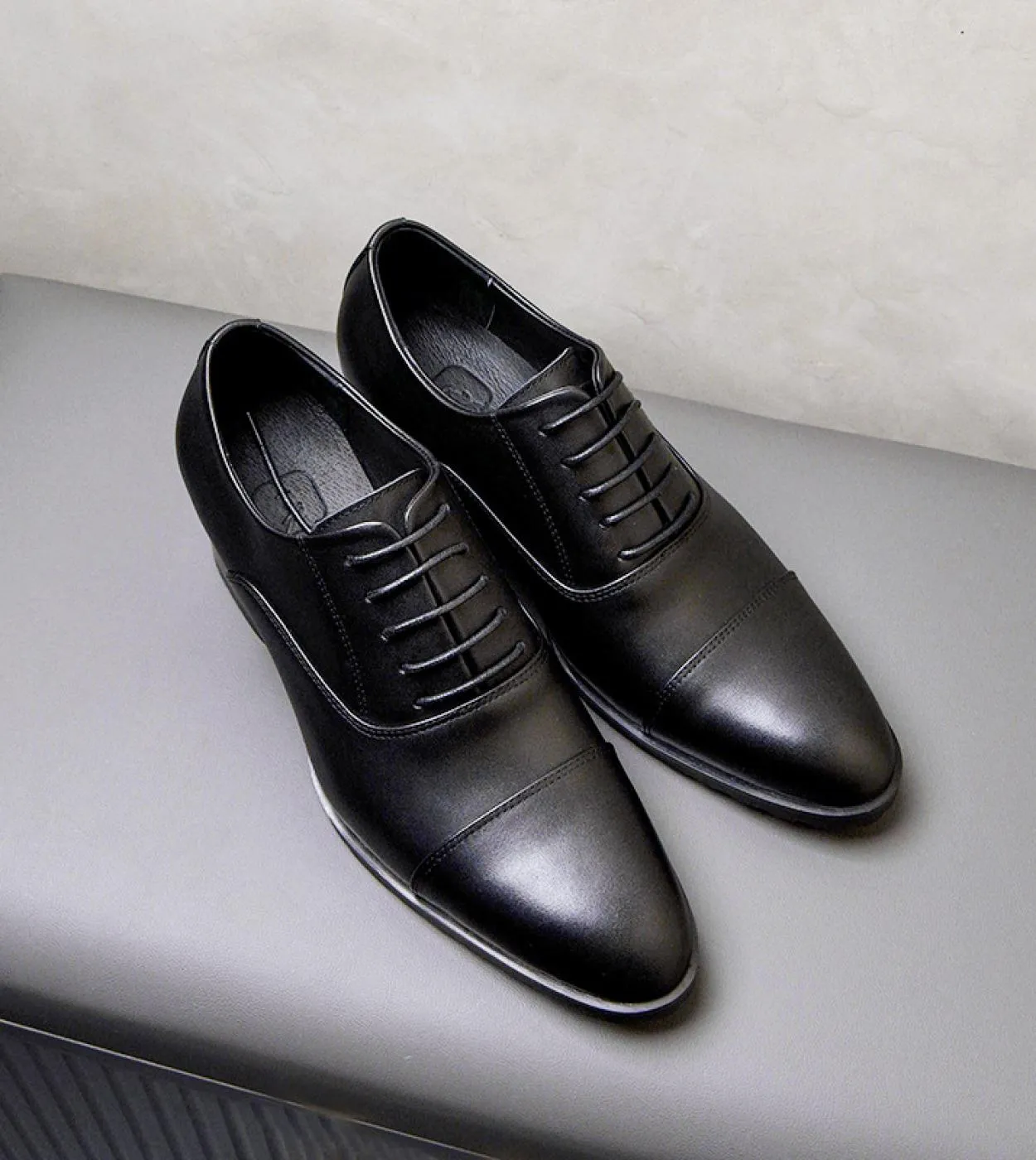 Men's leather shoes with 5 cm high heel. Handmade luxury black genuine leather men's shoes for parties and work.