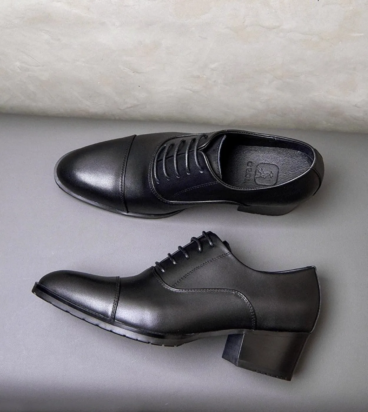 Men's leather shoes with 5 cm high heel. Handmade luxury black genuine leather men's shoes for parties and work.