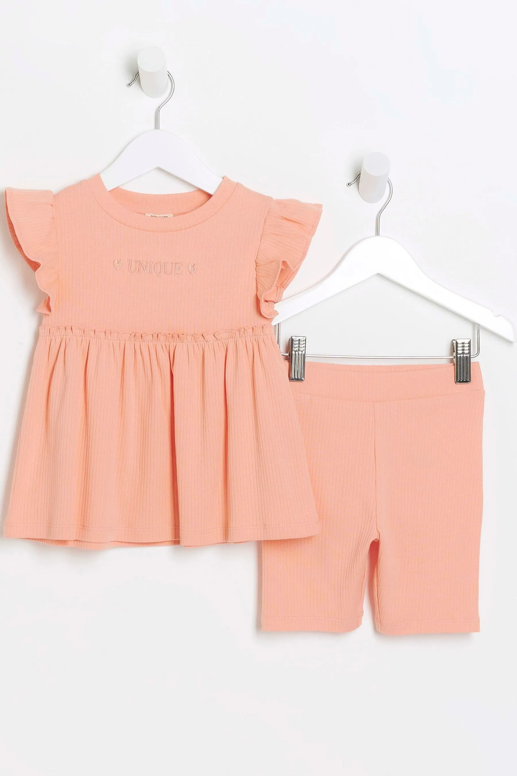 River Island Girls - Completo shorts e top con peplo a coste    