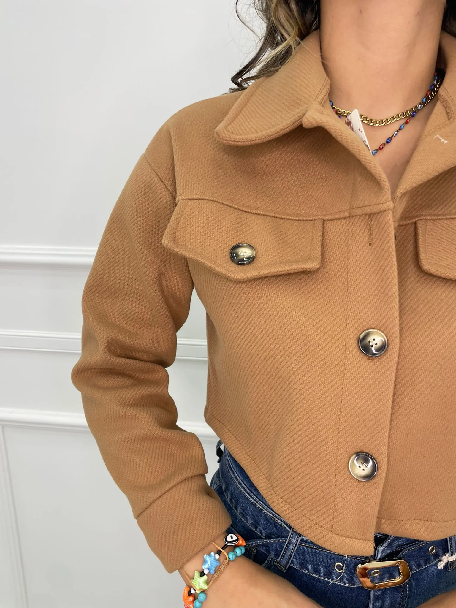 Short solid color coat.