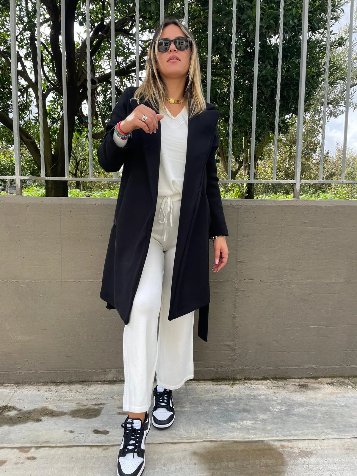Solid color coat with belt.