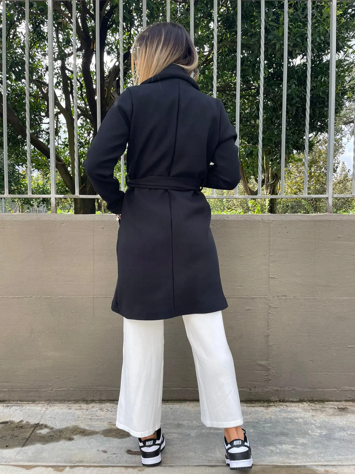 Solid color coat with belt.
