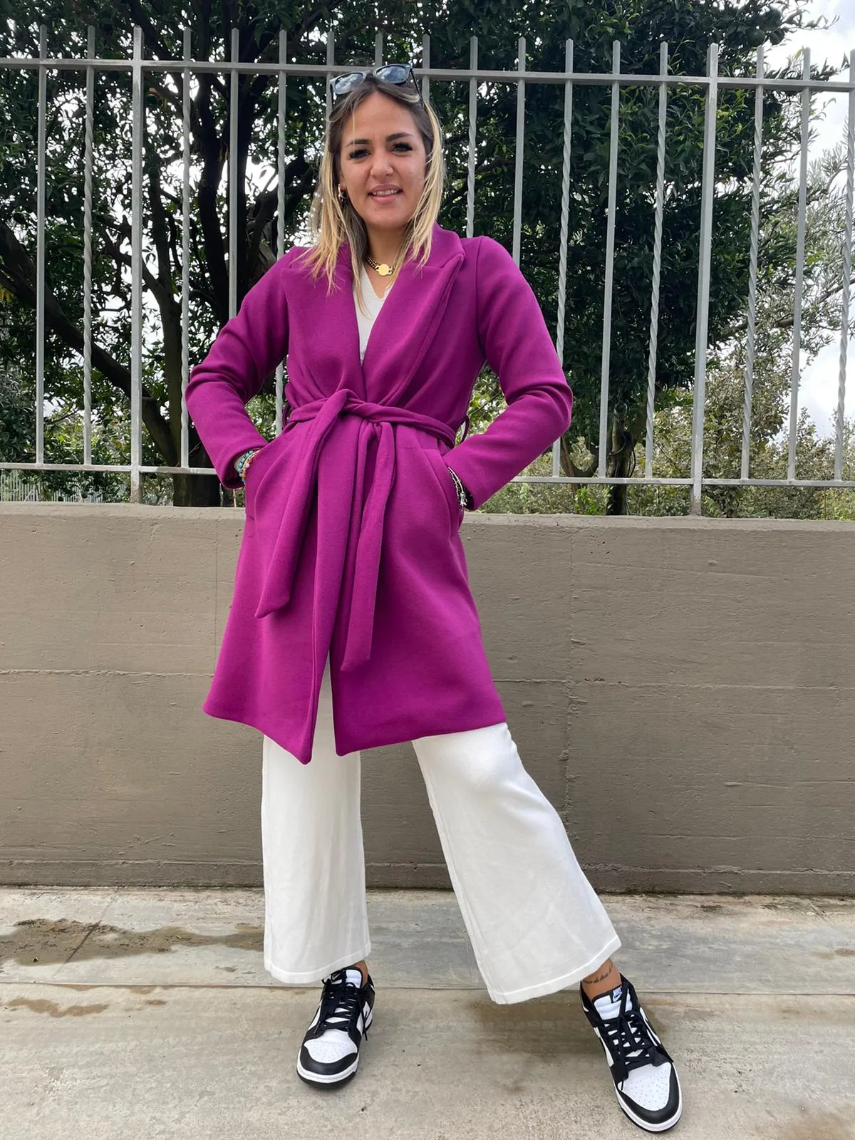Solid color coat with belt.