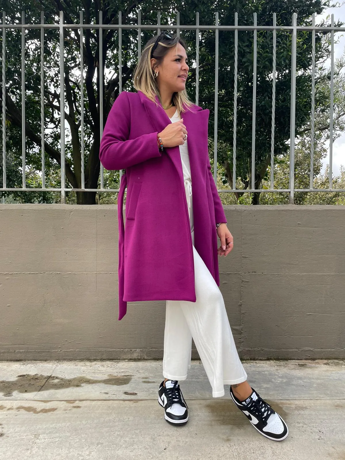 Solid color coat with belt.