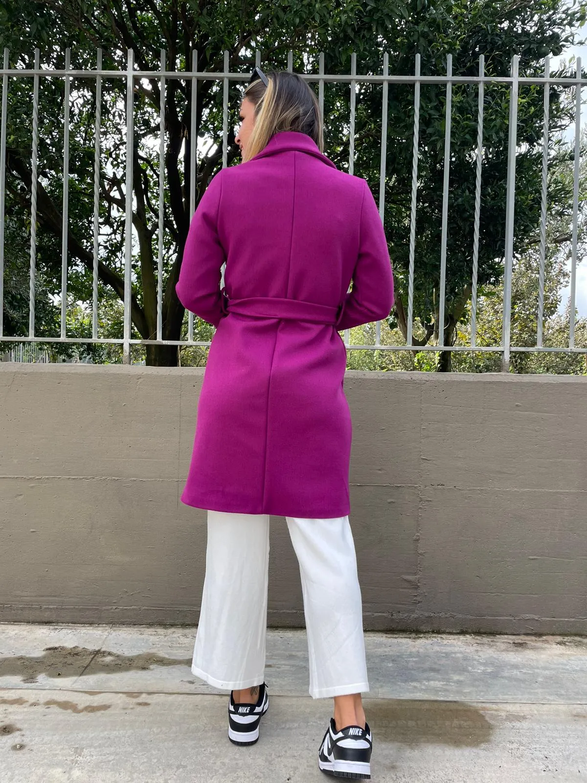 Solid color coat with belt.