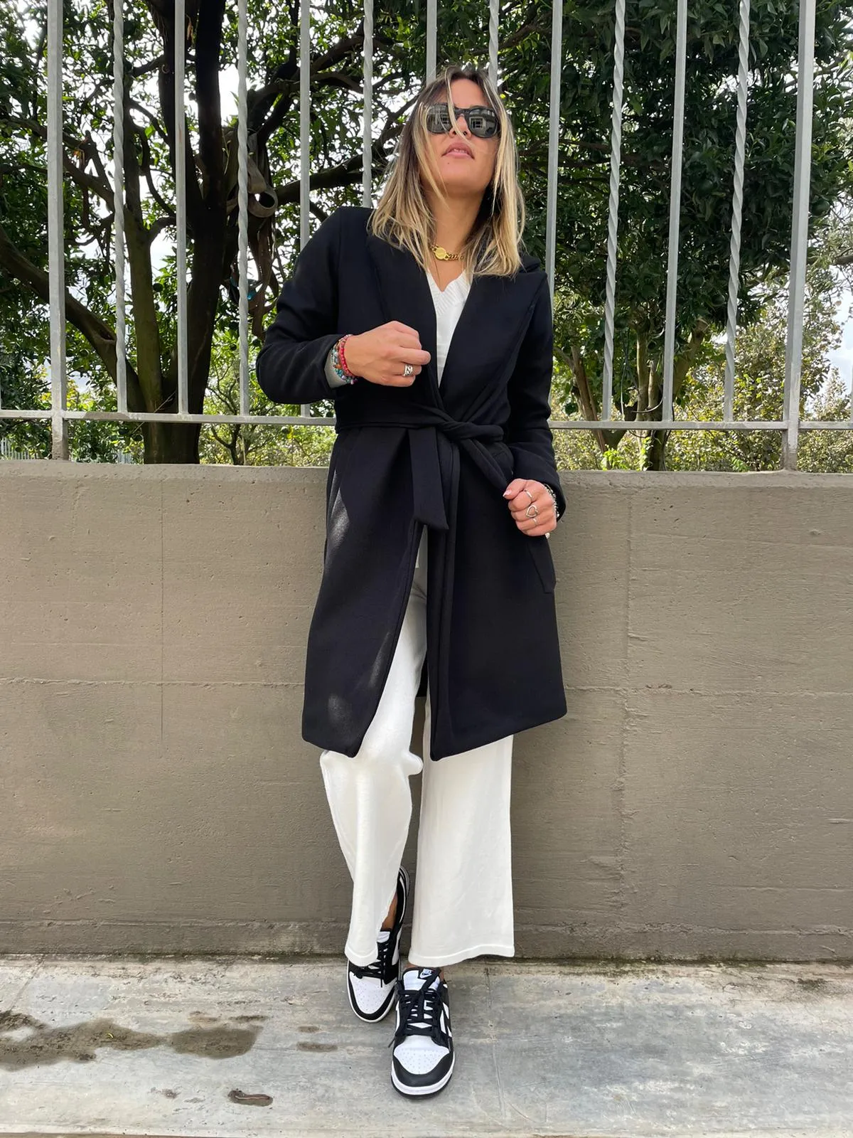 Solid color coat with belt.